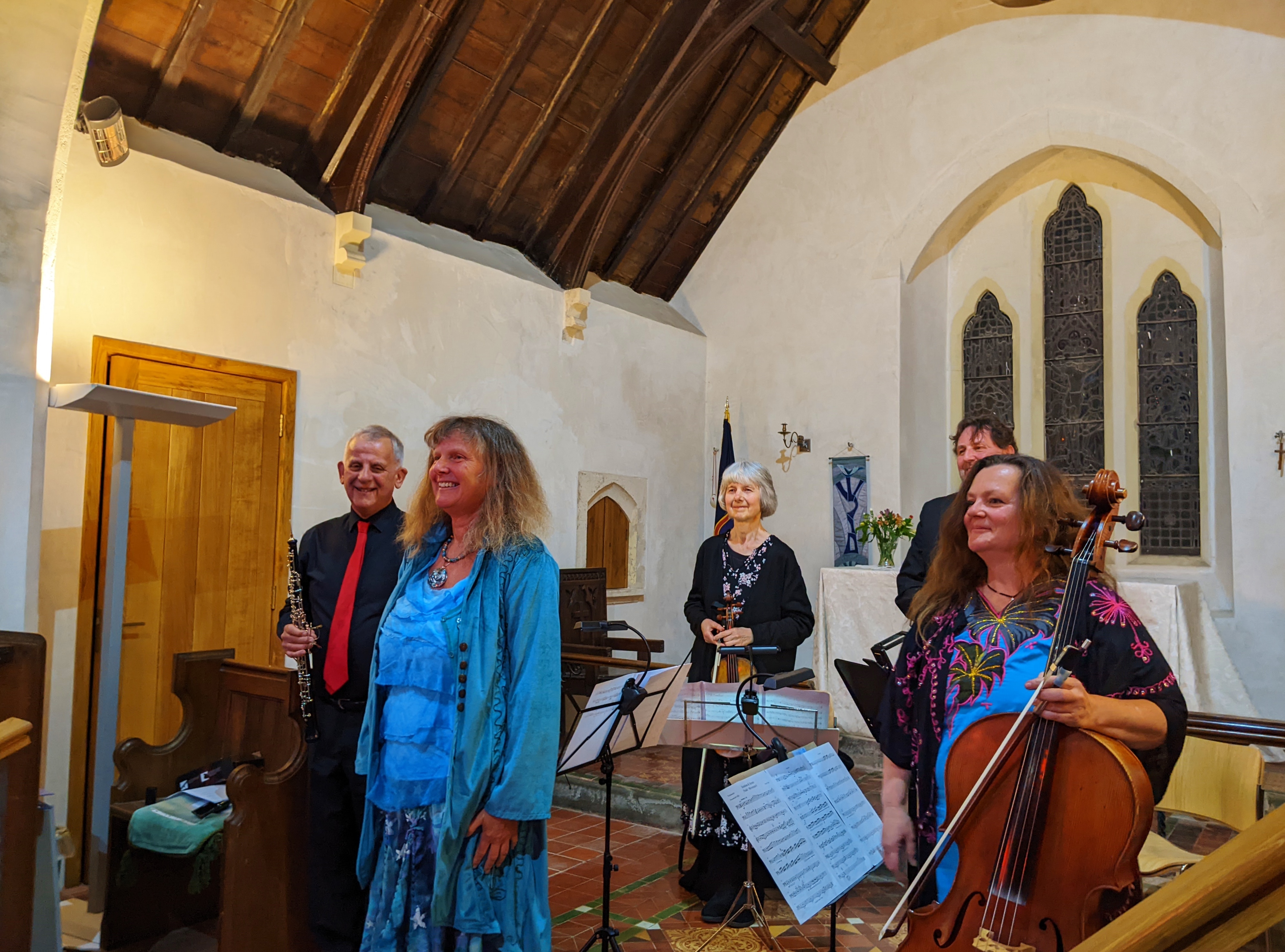Smiles all round- St Woolos Sinfonia principals oboe quartet and Fiona receive applause